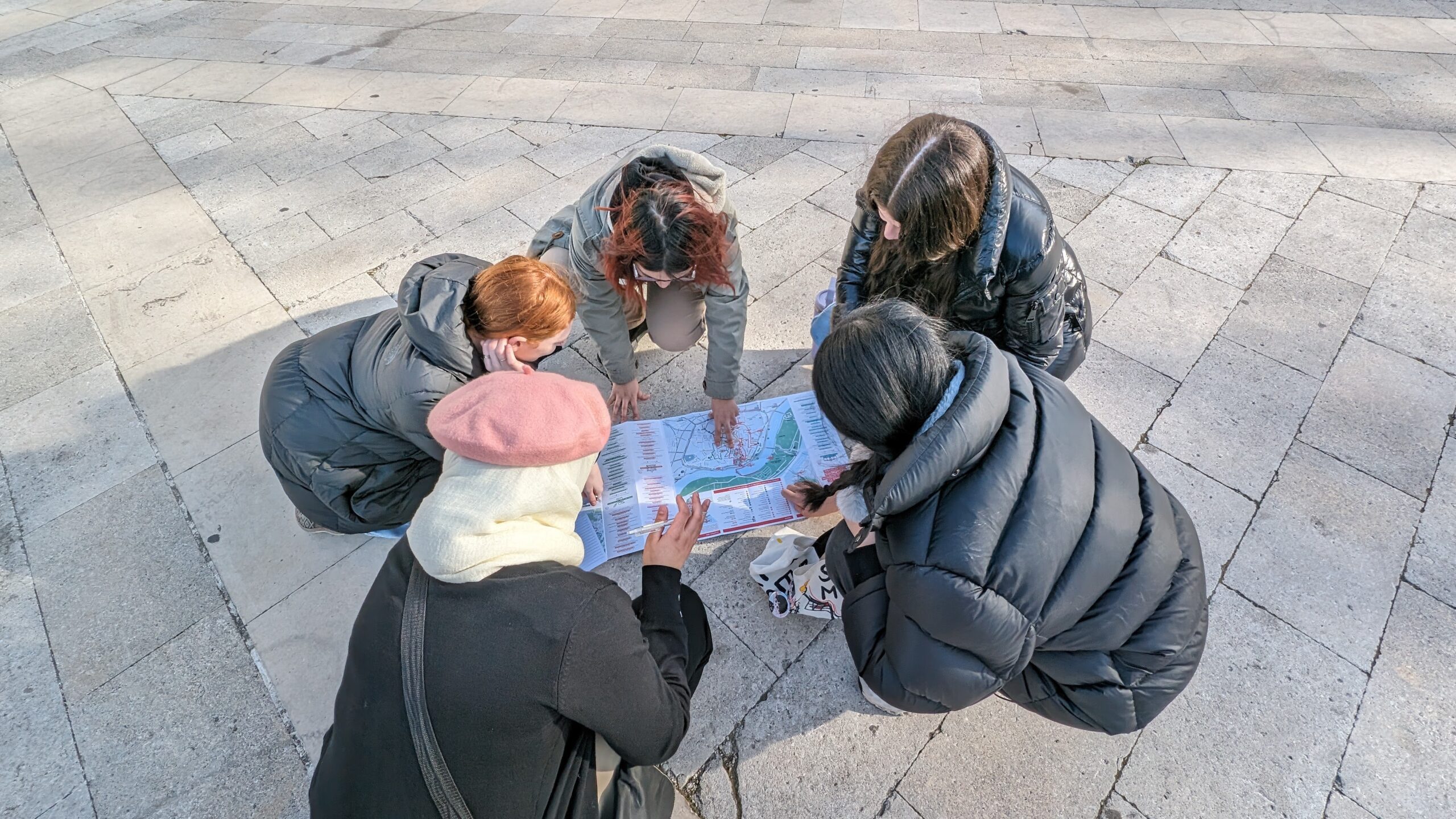 Students studying a map